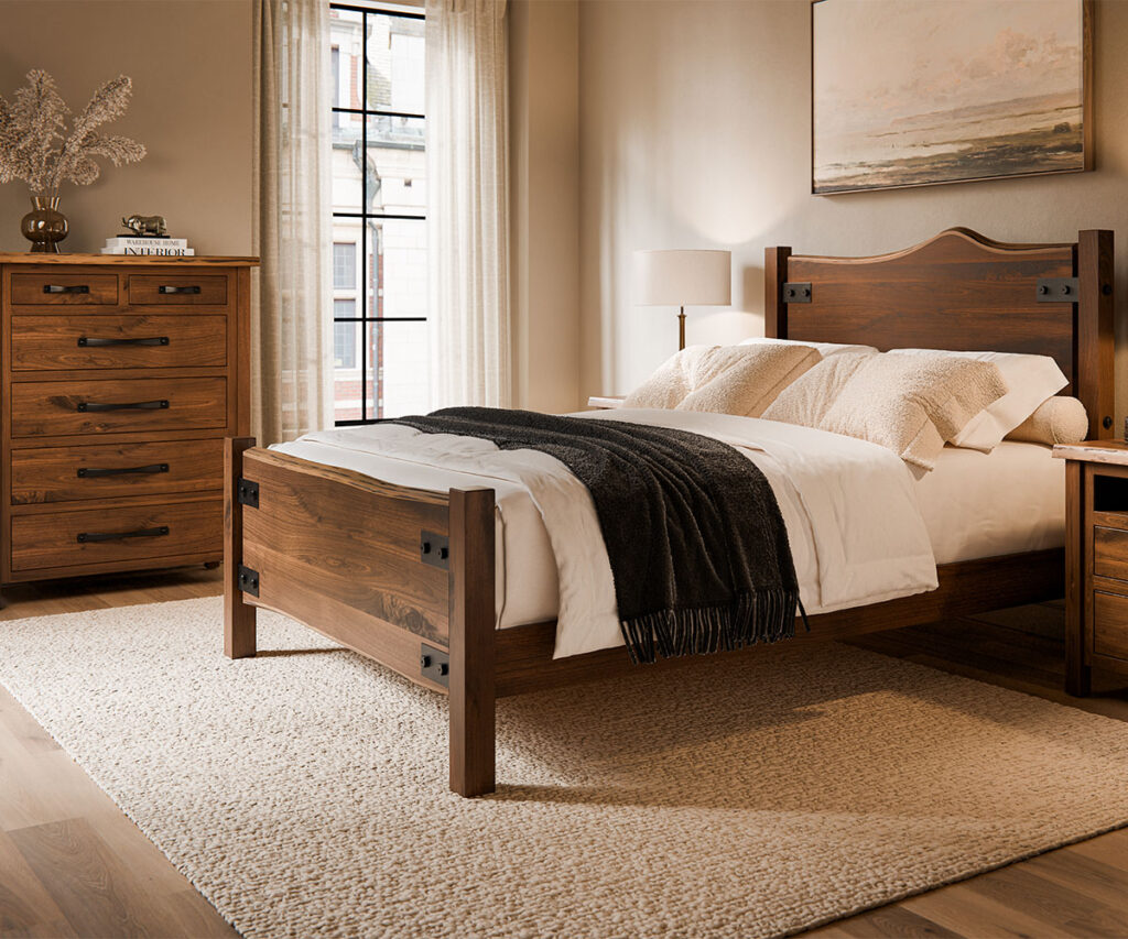 Solid wood bedroom furniture with bed, chest, and nightstand in a warm neutral room.