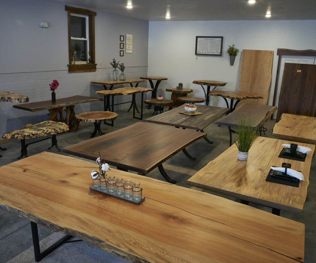 Williamsburg Amish custom furniture showroom with live-edge dining tables and benches on display.