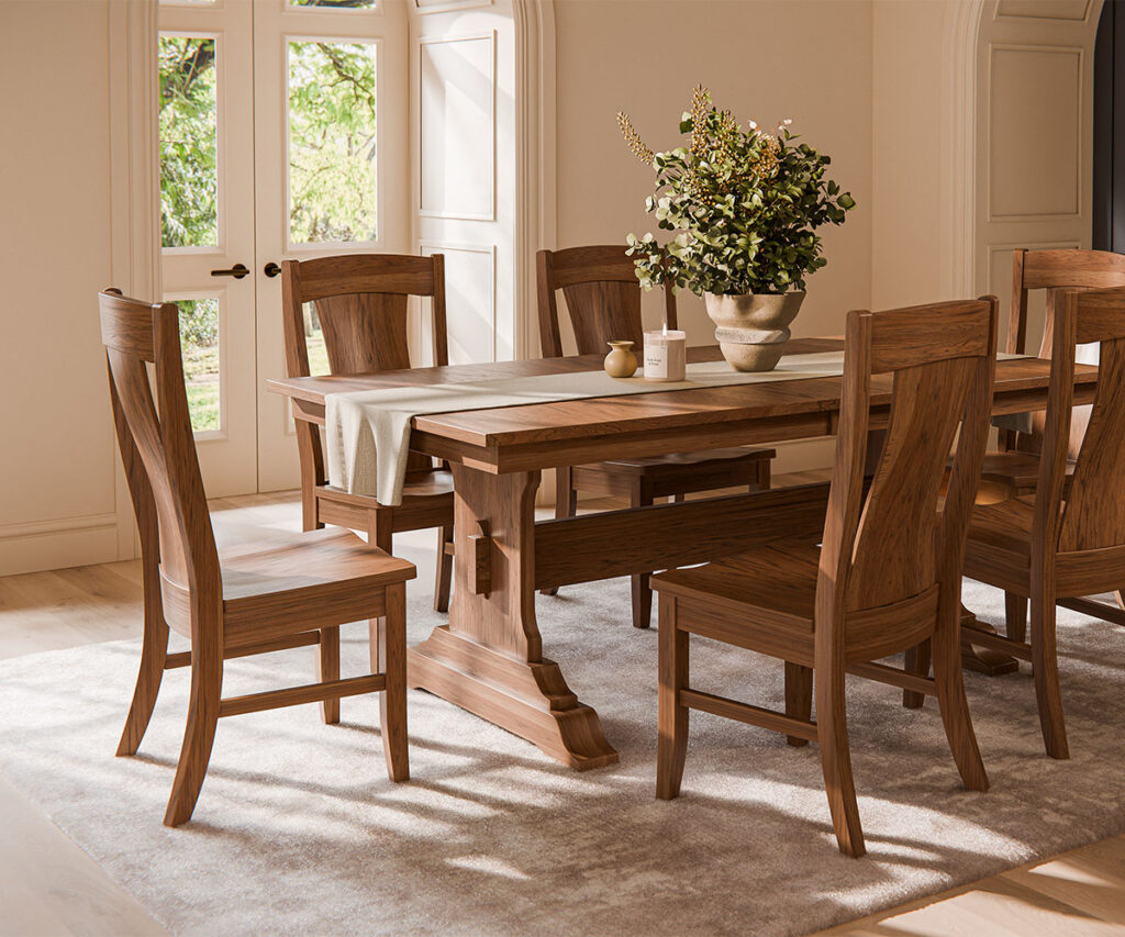 Solid wood dining table and chairs in a bright neutral room